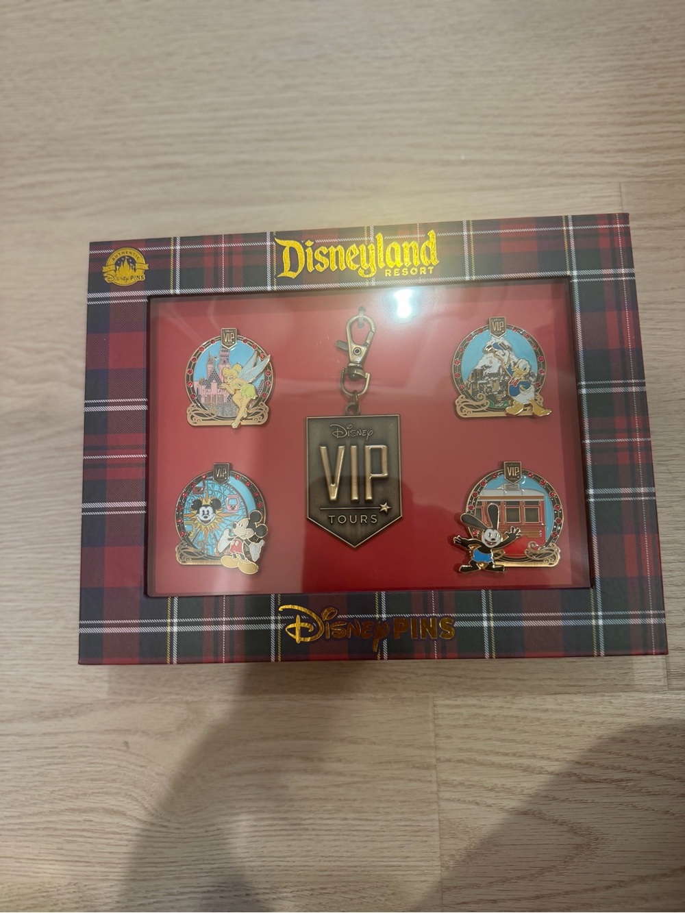 Disneyland VIP Tours Pin Display — Red & Plaid Presentation